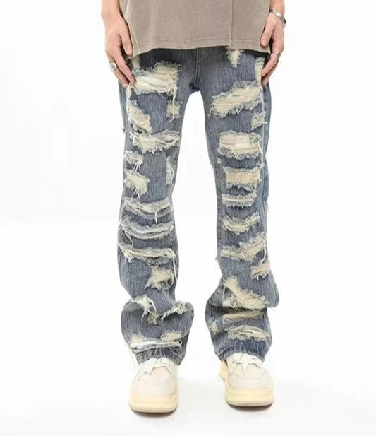 Jeans With Ripped Design