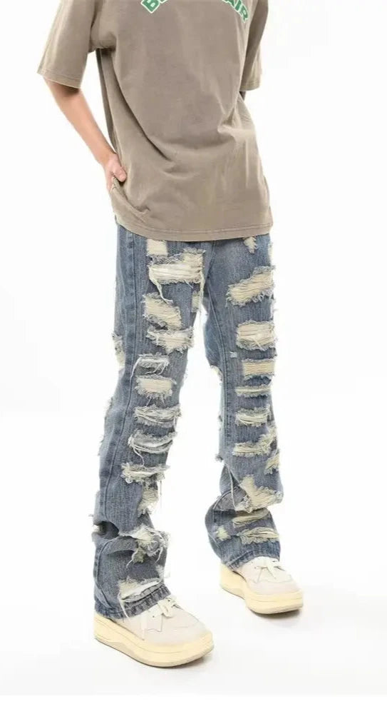 Jeans With Ripped Design